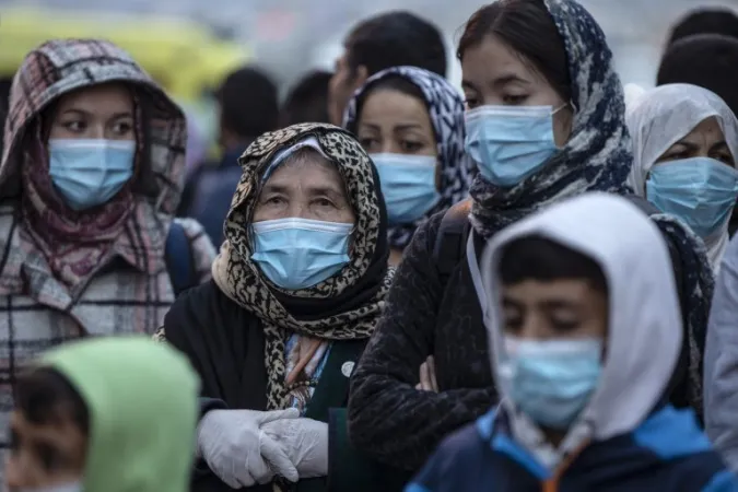Migranti e coronavirus | Migranti con la mascherina per proteggersi dal coronavirus | infomigrants