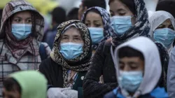 Migranti con la mascherina per proteggersi dal coronavirus / infomigrants