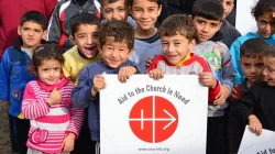 I bambini iracheni con il logo di ACS / ACS