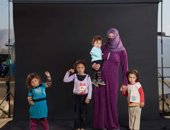 Una famiglia di rifugiati siriani, in un ritratto di Caritas Internationalis | Caritas Internationalis - da syria.caritas.org