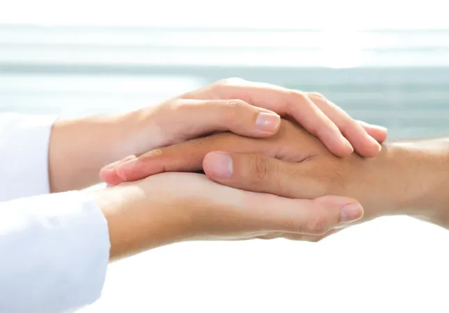 Mani che si uniscono |  | Diocesi di Torino